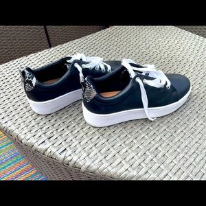 Halogen sneakers with snakeskin heel and tongue